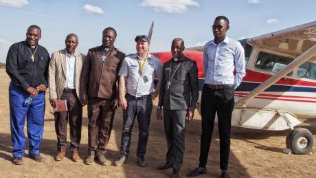 Pilot Jarkko posing with different church leaders. 