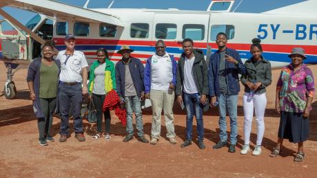 Pilot Daniel with a team of medics, vets and a MAF staff at Kalama Airstrip in Samburu County.