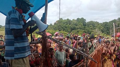 Local dignitaries hold speech at testlanding for Aiyu Airstrip