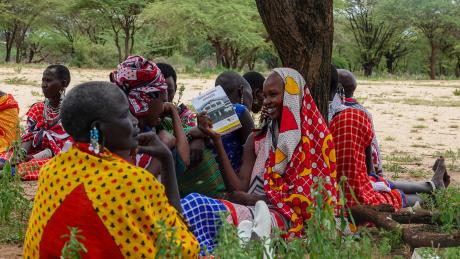 Joyful Maasai women during a training about Obstetric fistula