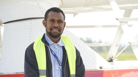 Anthony Mabo posing in front of P2-WET