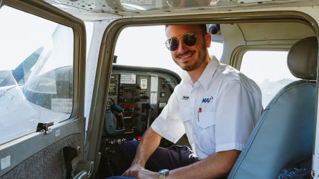 Student pilot seated in aircraft