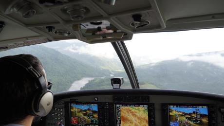 MAF plane on final to Sisamin airstip - cockpit view with pilot Ryan Cole