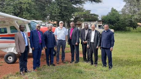 Pilot Mark Liprini with the guests he flew to attend the celebration