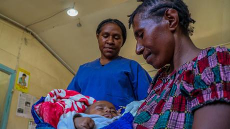 Ailin Efako and her Baby 1 are being attended to by Nursing Officer Mulda Monopi at Sigerehe Health Centre.