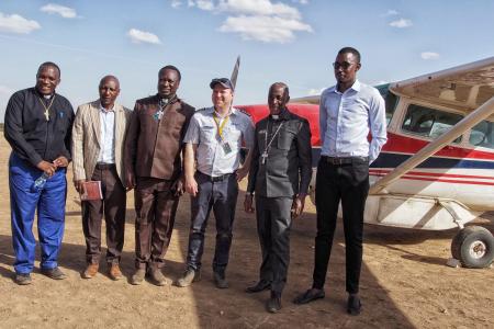 Pilot Jarkko posing with different church leaders. 