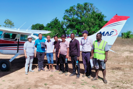 Real Mission Movement team on Soalala airstrip with MAF plane and pilot Ryan Unger