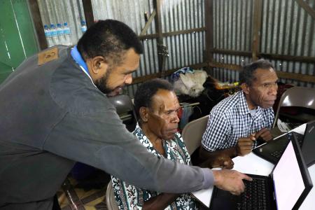 Caine Ruruk, MAF Technologies training facilitator, assisting participants during a session