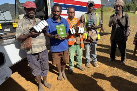 Pastors at Sengapi holding Bibles
