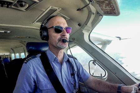 A pilot in the cockpit