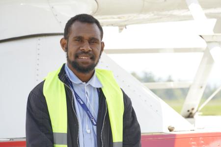 Anthony Mabo posing in front of P2-WET