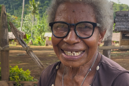 Mama Pokome Newa smiling