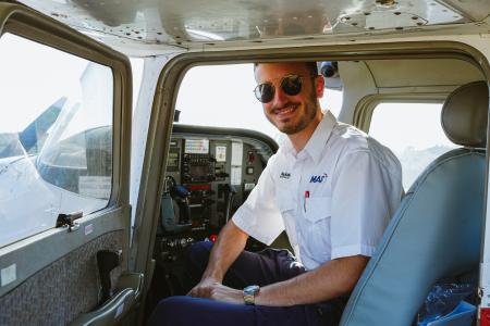 Student pilot seated in aircraft