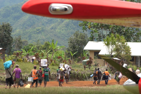 Medical supplies being carried to the aid post