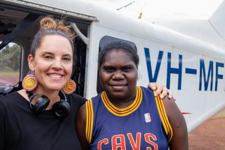 Teacher and Homeland Teacher in fromn to MAF aircraft