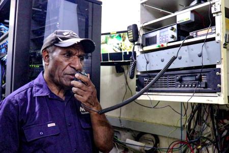 Jacob Dinoke operating a High Frequency Radio