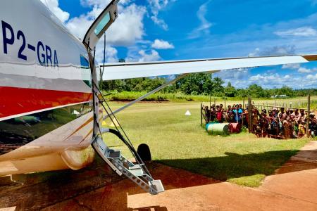 P2-GRA transporting students from Kiunga to a secondary school in Mougulu.