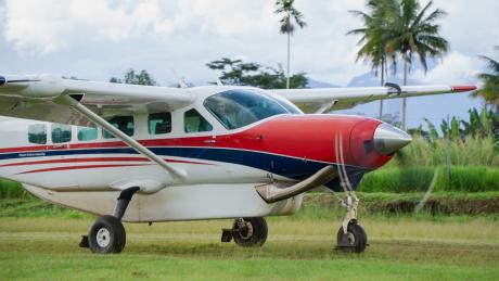 A MAF plane taxis in after landing