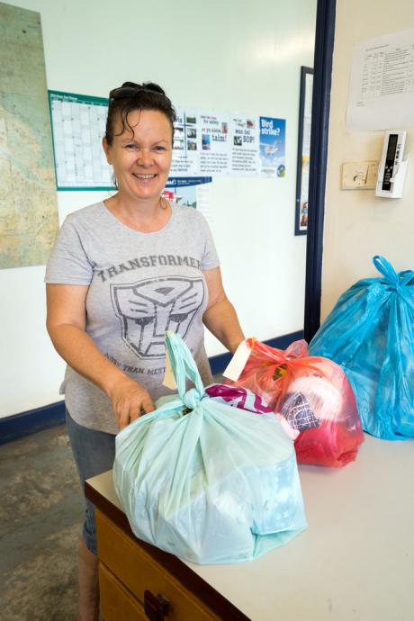 Clare puts together baby packs, with essential items