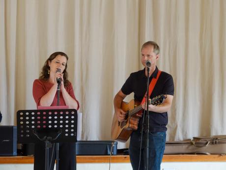 Pilot Daniel with his wife Damaris leading worship during the MAF global prayer day.