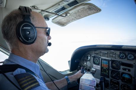 A pilot in the cockpit