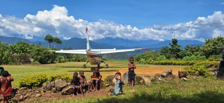 view down the airstrip with people