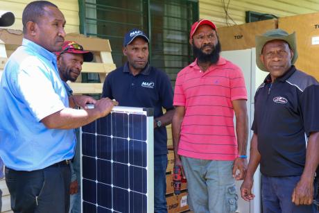 Bob, second from the right, during his HF and solar training at the MAF Technologies base in Goroka.