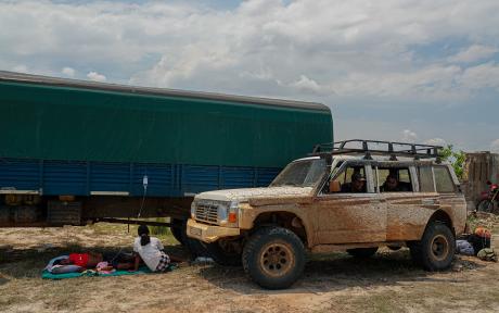 Tahiana in the shade of a big truck