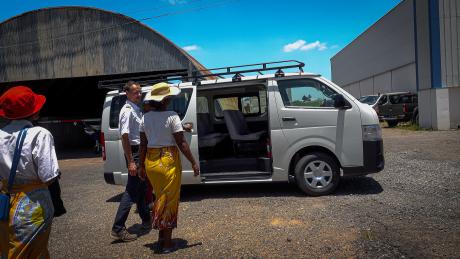 Angeline getting in a MAF Van