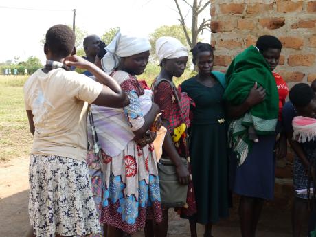 Mothers queuing for registration before attending the conference
