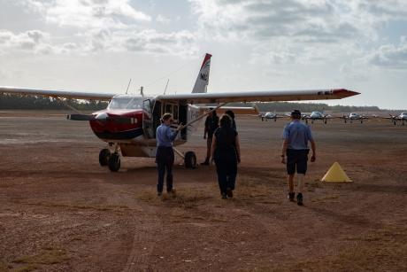 MAF staff walking out to medevac aircraft