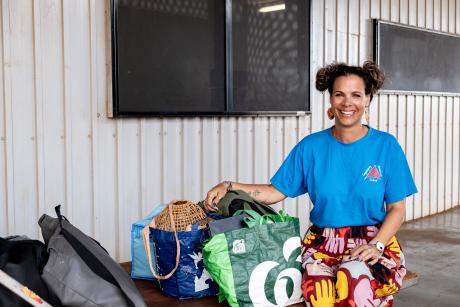 Teacher at airport with luggage