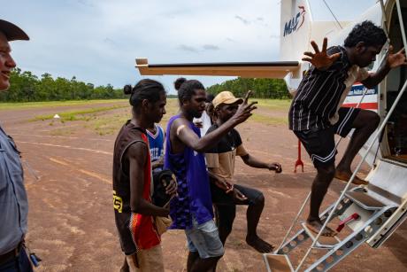students board plane