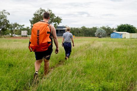 Physiotherapist and pilot returning to plane