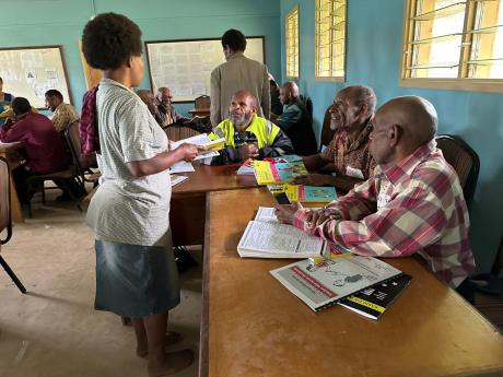 Bilum Books training course with teachers sitting around tables and working in groups
