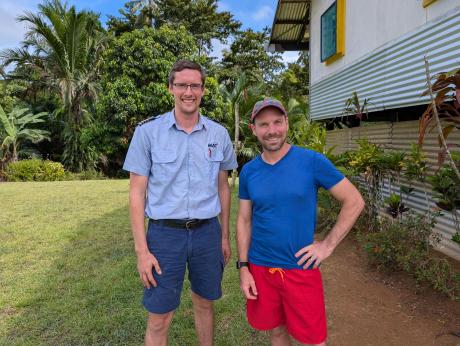 MAF pilot Brandon and missionary Caleb next to the mission house