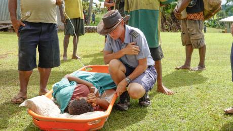 A week’s walk in 25 minutes: Medevac just in time for Phimi