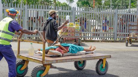 A week’s walk in 25 minutes: Medevac just in time for Phimi