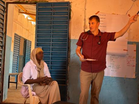 Dr. Luke training clinic staff