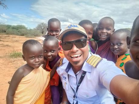 Pilot Roshan having a great time with the children
