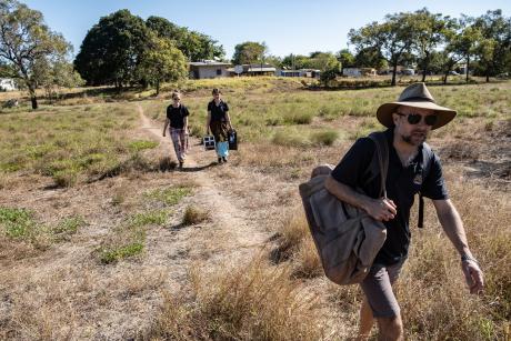 Healthcare workers walking back to aircarft after clinic