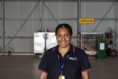 Papua New Guinean enginerr in hangar