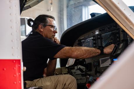 Avionics expert working in aircraft