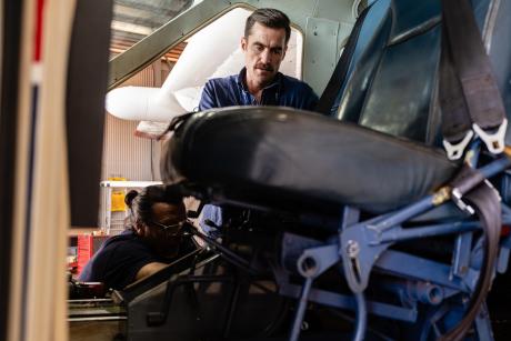 Engineers completing repairs on Cessna caravan.