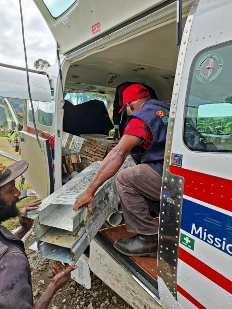 Unloading building material from P2-AFD for a health center