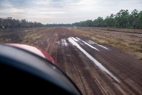 Water standing on dirt airstrip