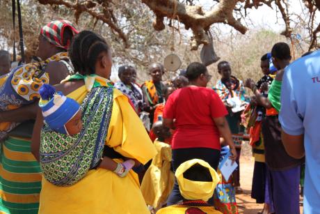 Raheli Mzava instructs the mothers at the clinic