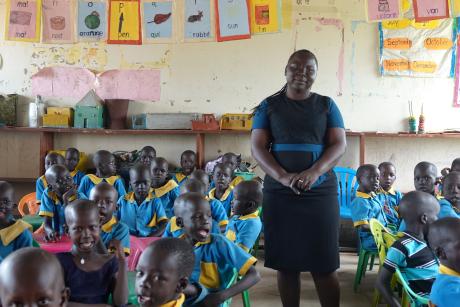 Teacher Stella Baru with her pupils